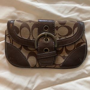Used small Coach clutch
